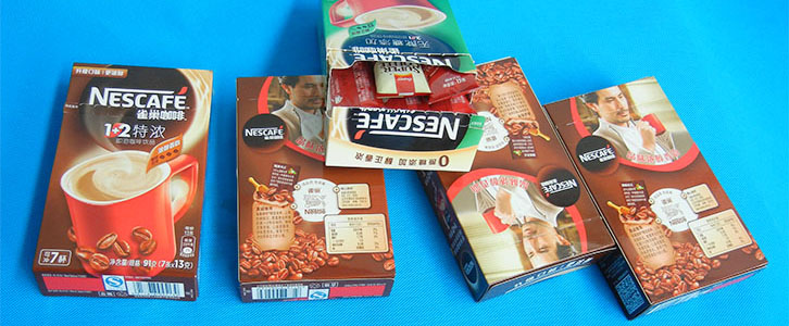 半自動高速裝盒機包裝紙盒.jpg 14684783789280775.jpg